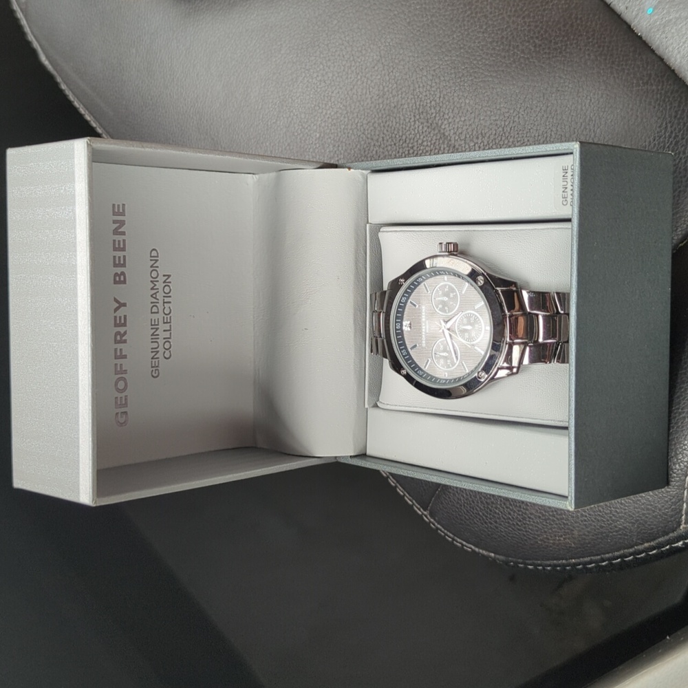 Geoffrey Beene watch genuine diamond